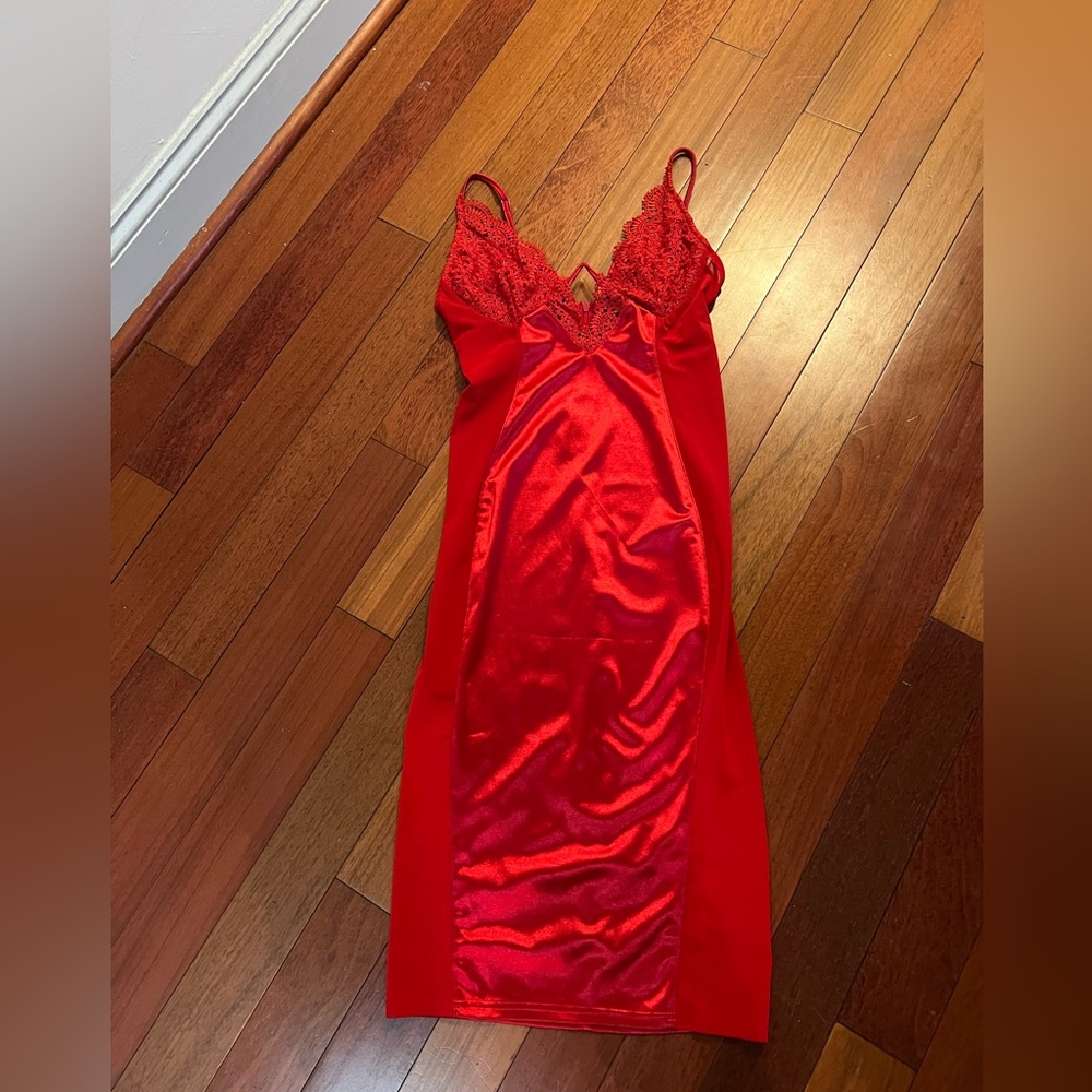 Sexy red dress with see through side panels and built in underwear bra. New!